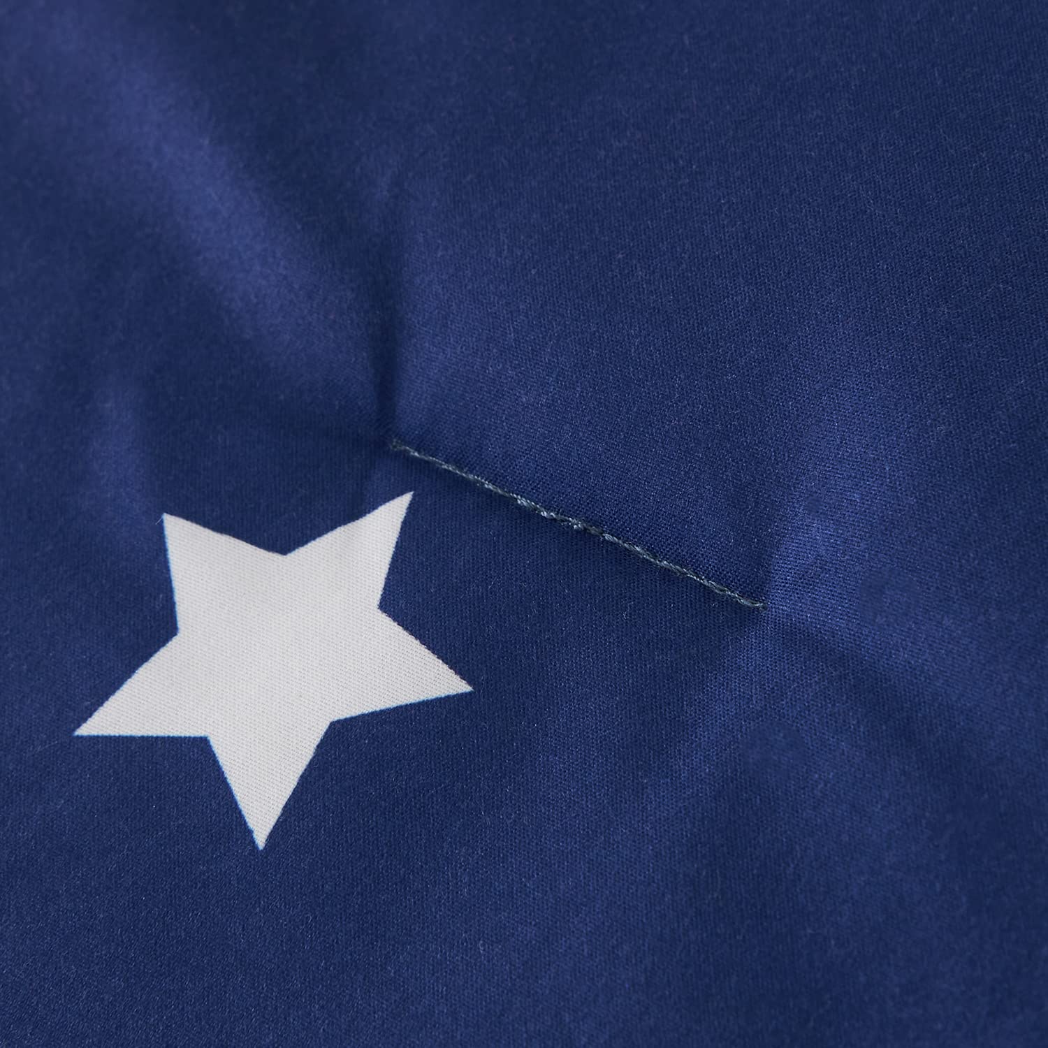 URBONUR baseball pattern detail adds playful energy to bedtime decor