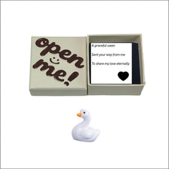 UrLLssMo Open Me box reveals swan figurine for romantic surprise