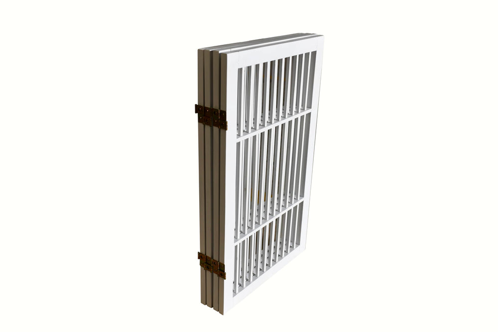 Urnporium portable wooden pet gate ready to move between rooms.