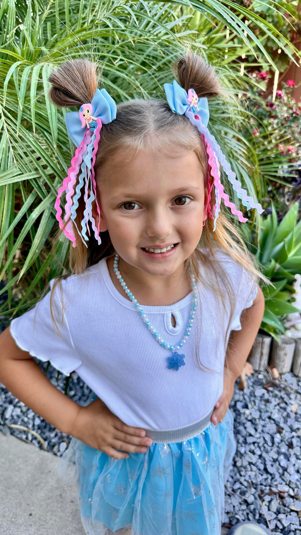 Usakinon Mermaid Bows with wavy streamers add movement.