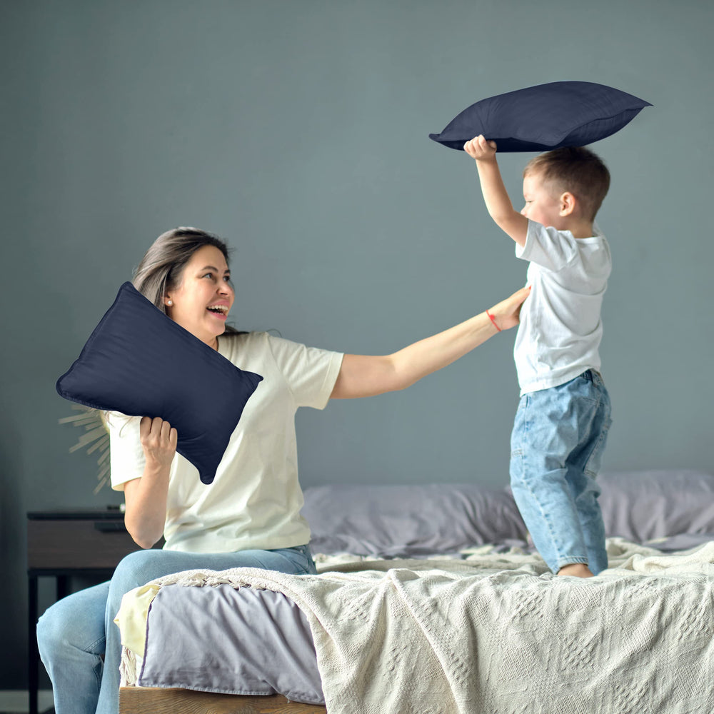 Utopia Bedding navy toddler pillow image emphasizing easy care for spot cleaning
