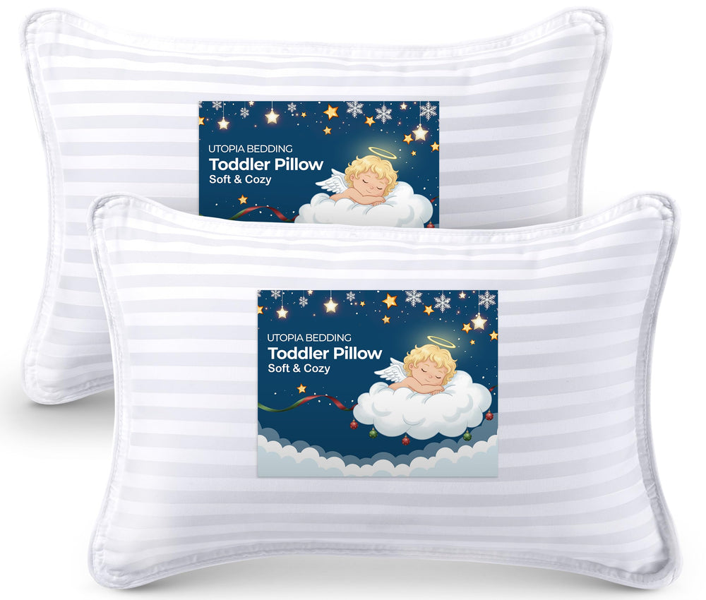 Utopia Bedding toddler pillow pack 2 on a kid's bed for cozy sleep.
