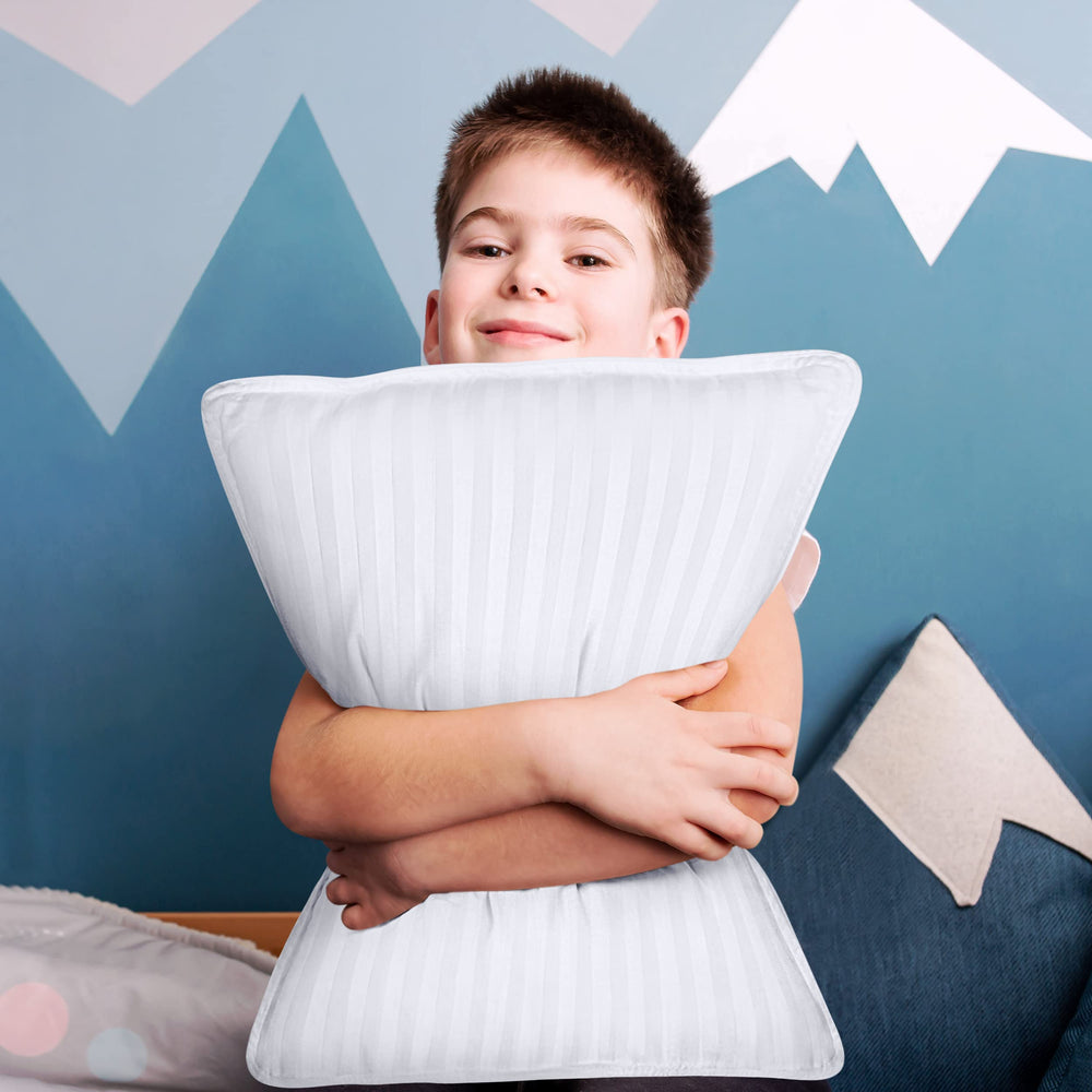 Utopia Bedding Youth Pillow Pack displayed on a kid's bed for easy setup.