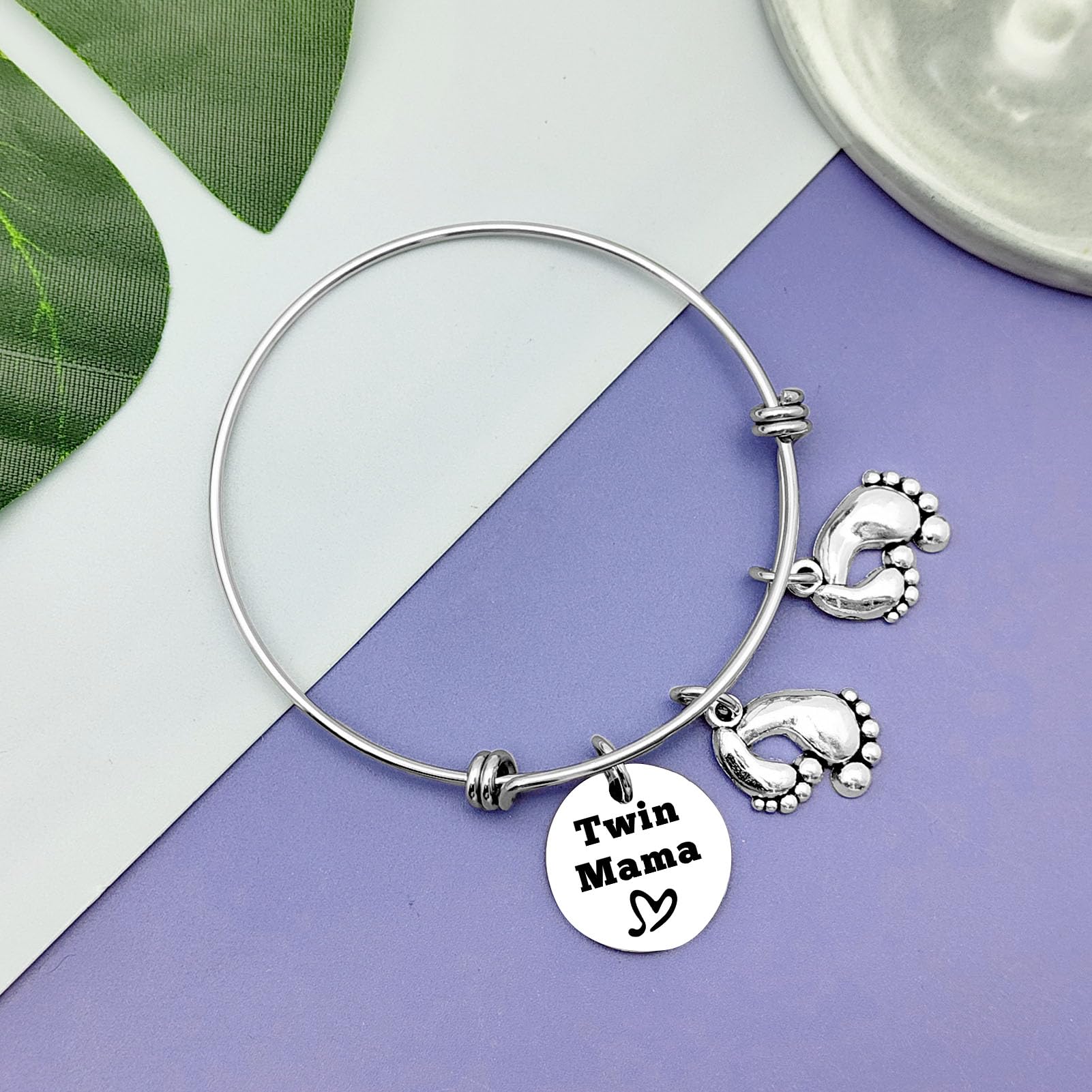 Vadaka Twins Mama Jewelry worn on wrist by model, elegant daily wear.