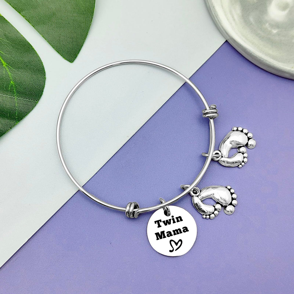 Vadaka Twins Mama Jewelry worn on wrist by model, elegant daily wear.