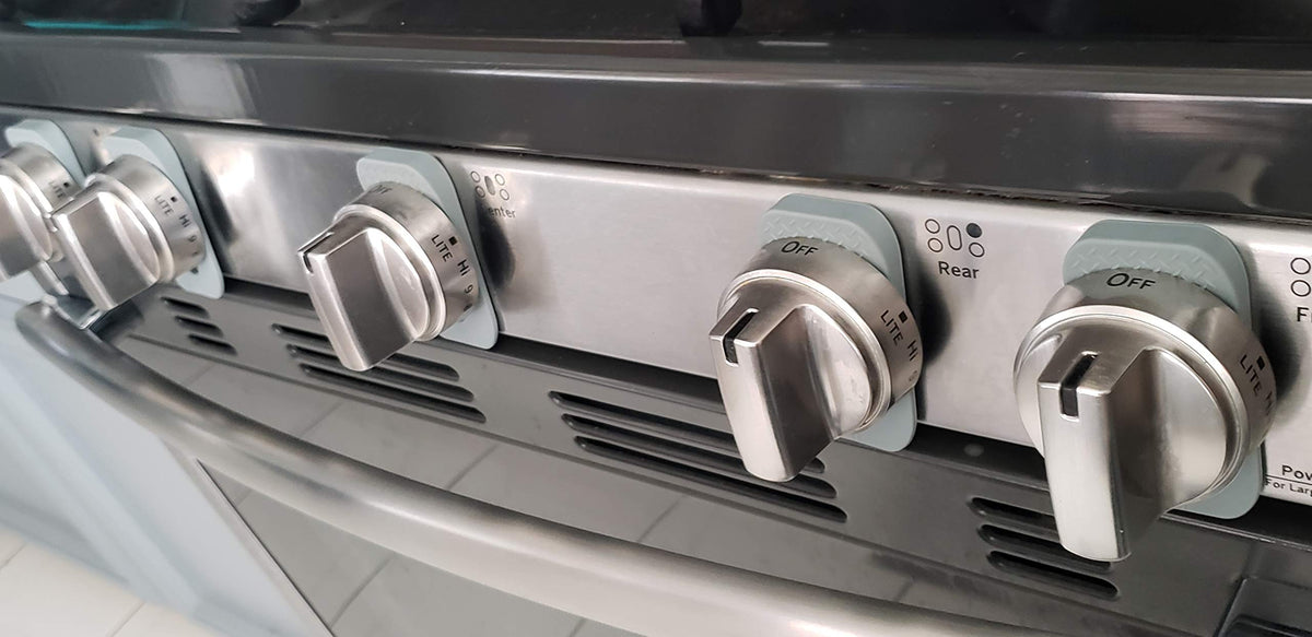 Vadiff gray gas stove knob locks prevent accidental burner activation.