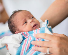 Vakly blanket 30x40 inches demonstrates full body coverage for swaddling.