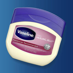 Close-up texture of Vaseline Healing Jelly Baby showing smooth barrier for dry skin.