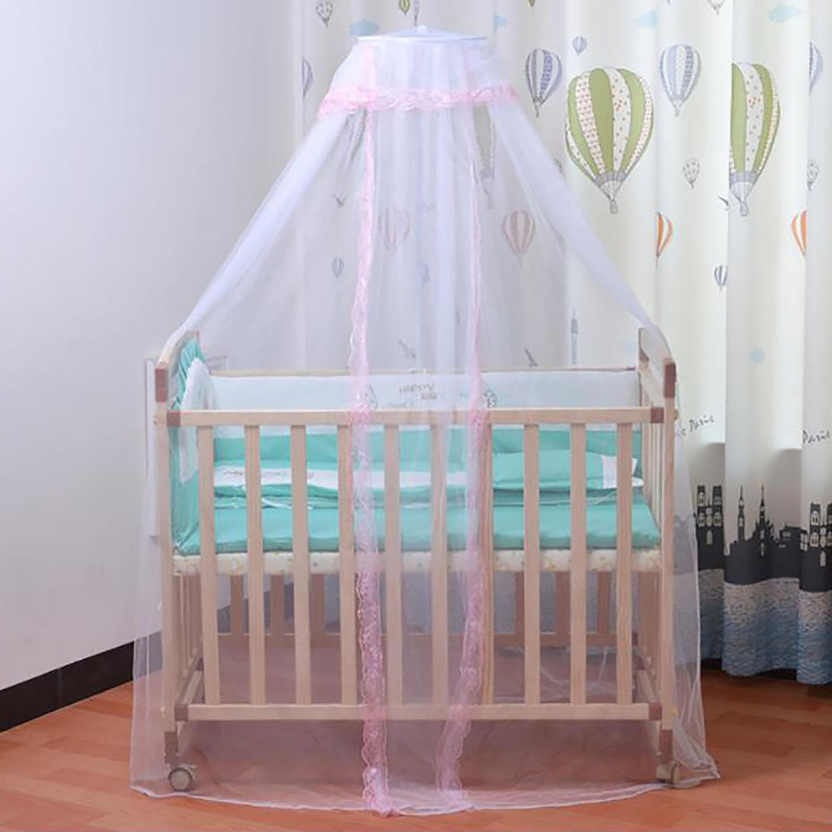 Vawolecy universal crib net folds over a crib to protect baby from insects