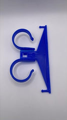 Ved Catheter Bag Hanger on a wheelchair hook provides stable support.