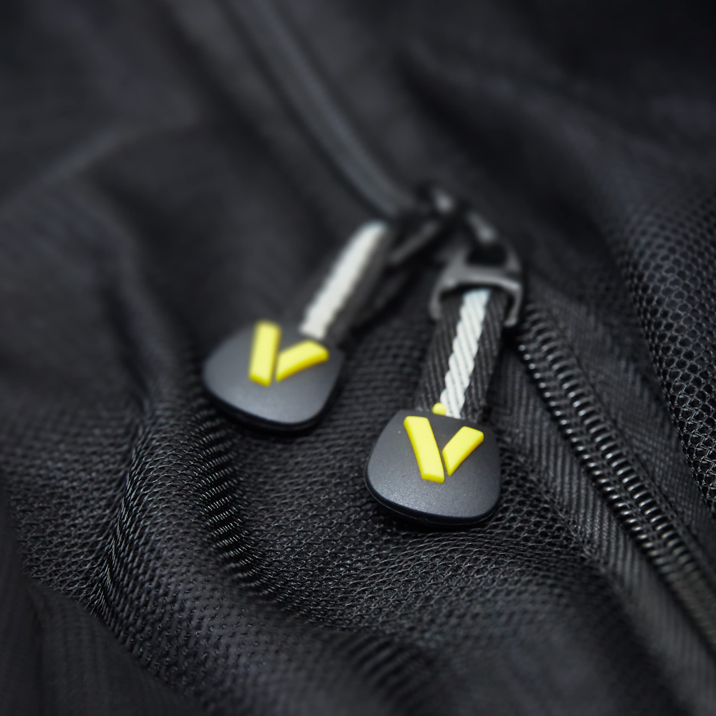 Veer mesh zipper hood adds capacity when covering bulky items.