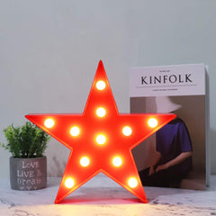 Vicila LED Star Sign on table stand brightens desks and bedside corners.
