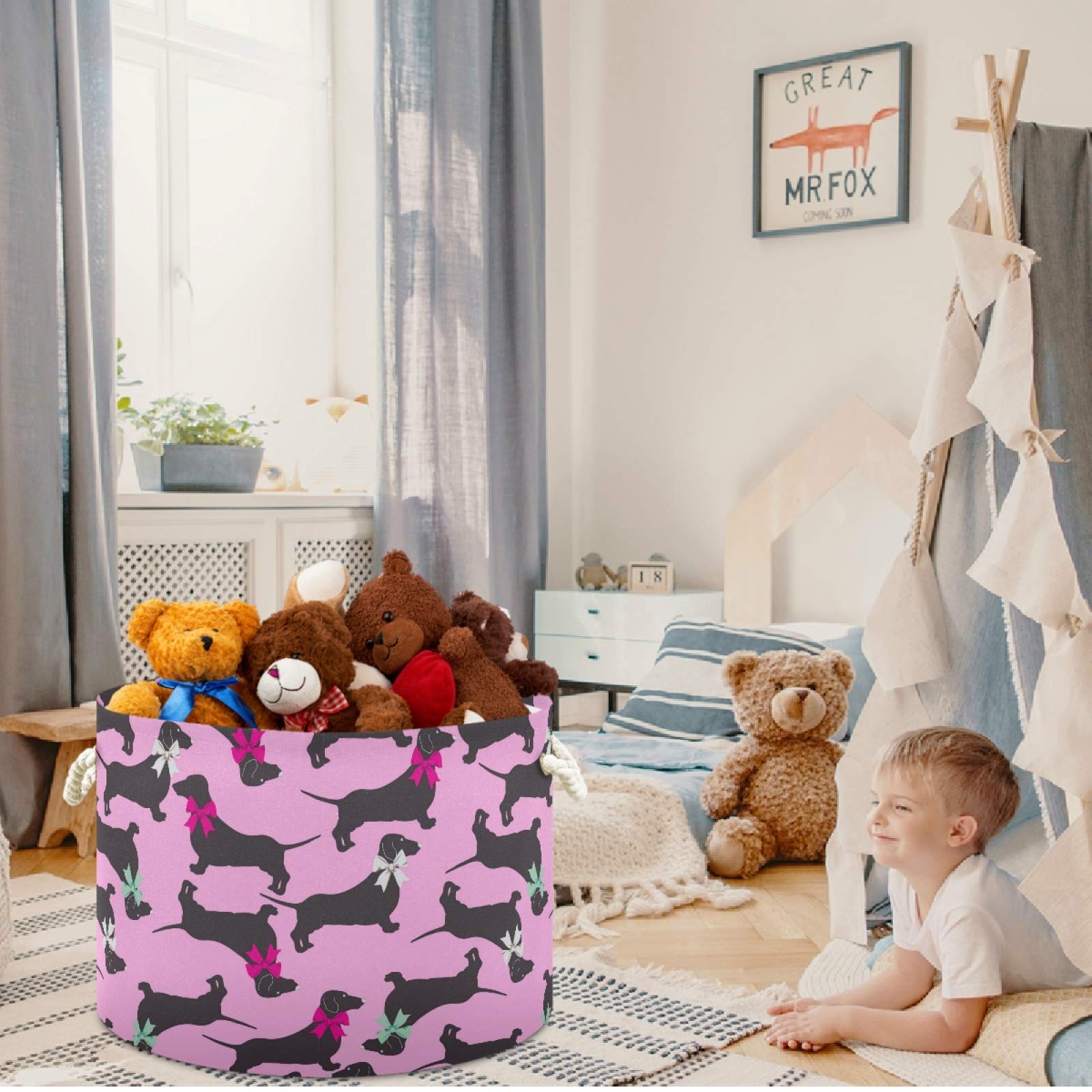 Visesunny cotton rope storage basket neatly organizes books and magazines.