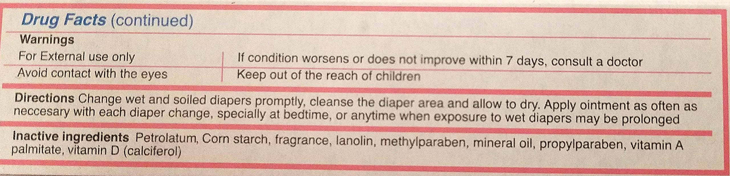 Applying Vitacilina Bebe to baby's diaper area for rash protection