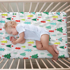 VitalCozy Christmas tree crib sheet print brings a bright focal point to bedtime