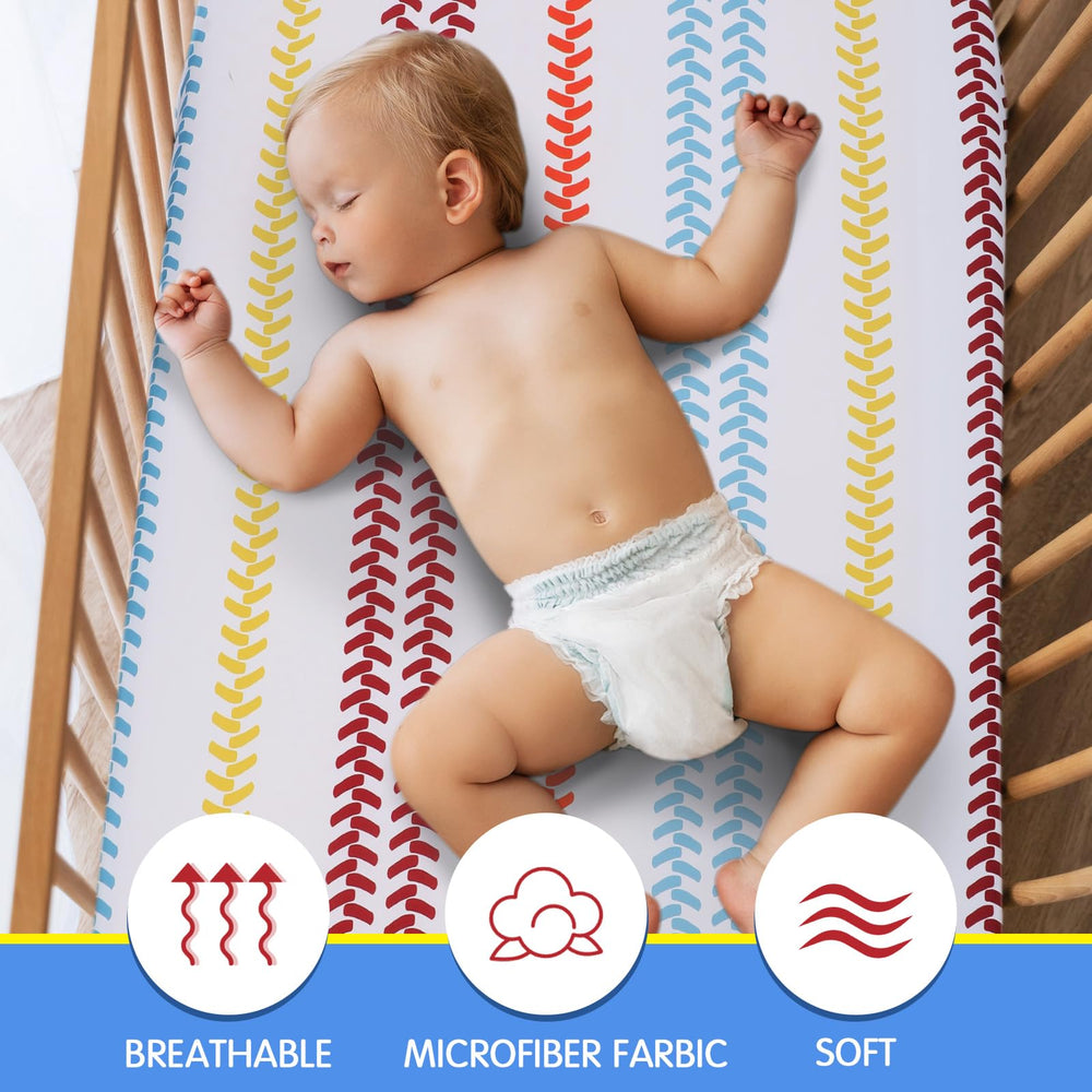 VitalCozy construction truck crib sheet on bed – snug fit for safe sleep.
