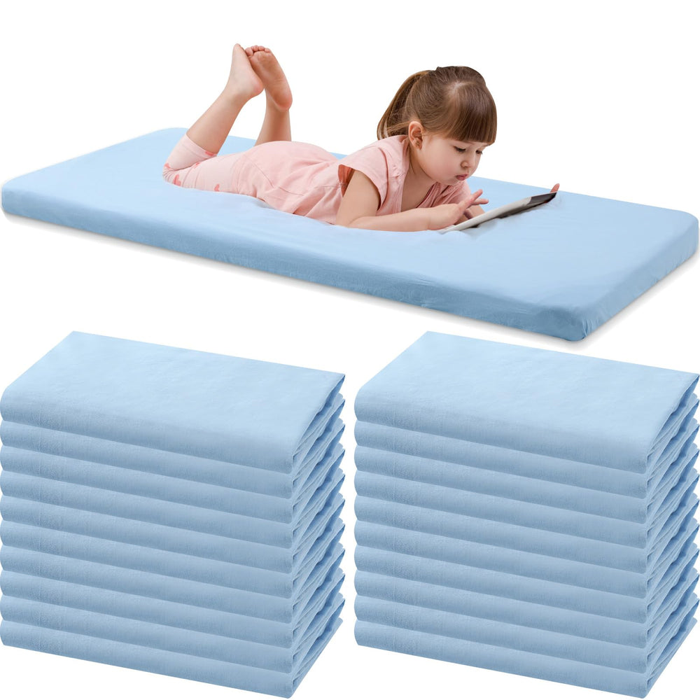 VitalCozy blue crib sheet with elastic edges for a secure fit.