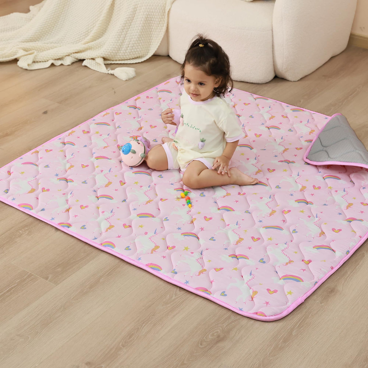 Viviland baby play mat with pink unicorn design for comfy crawling.