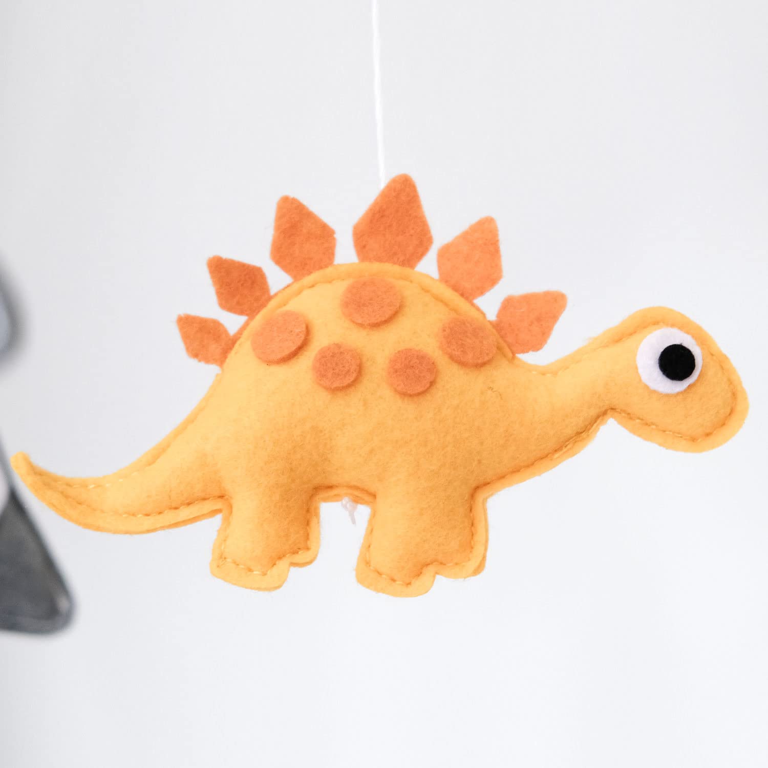 Vlokup boho dinosaur nursery decor adds charm to the room.