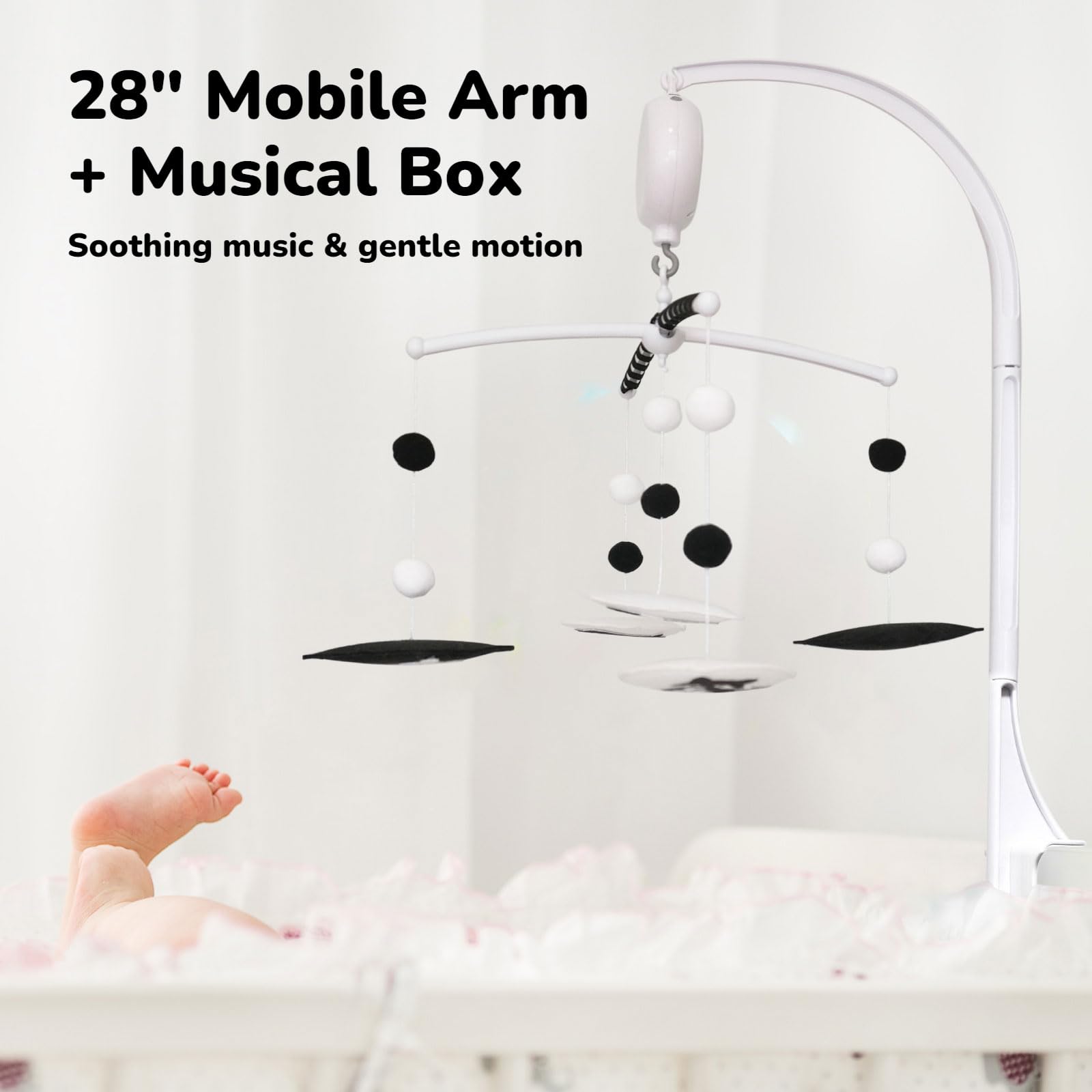 Vlokup spiral-arm clamp fits most cribs for flexible placement