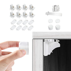 Vmaisi adhesive magnetic cabinet locks on a kitchen cabinet, keeping curious toddlers safe.