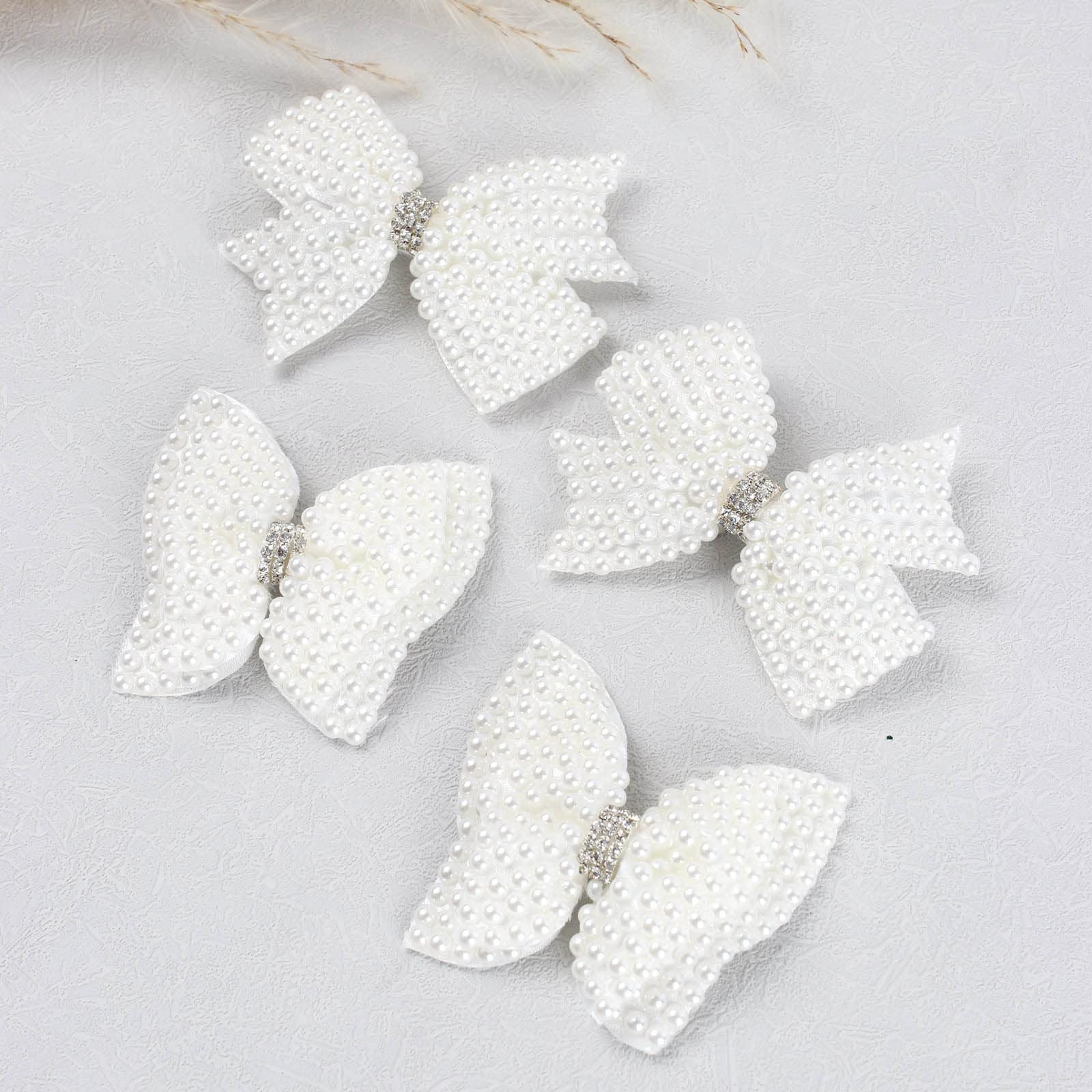 VOBOBE small pearl bow fits younger children for adorable styling.