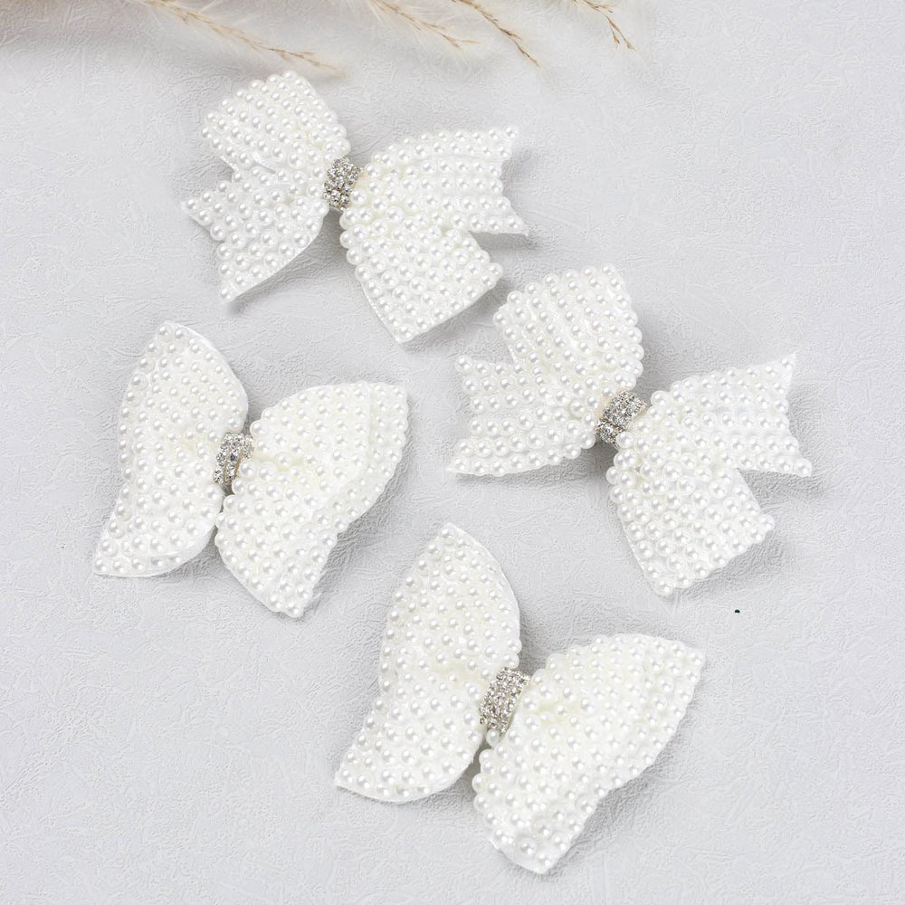 VOBOBE small pearl bow fits younger children for adorable styling.