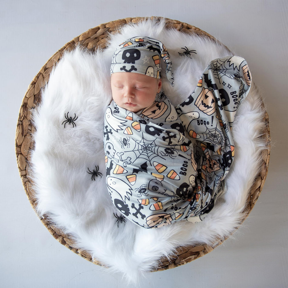 Vollmic newborn blanket grey flat lay shows soft knit comfort for easy swaddling