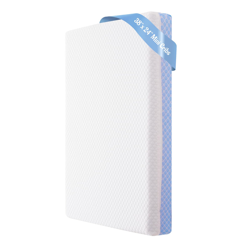 Vomiliku mini crib mattress with removable cover for quick cleaning and freshness.