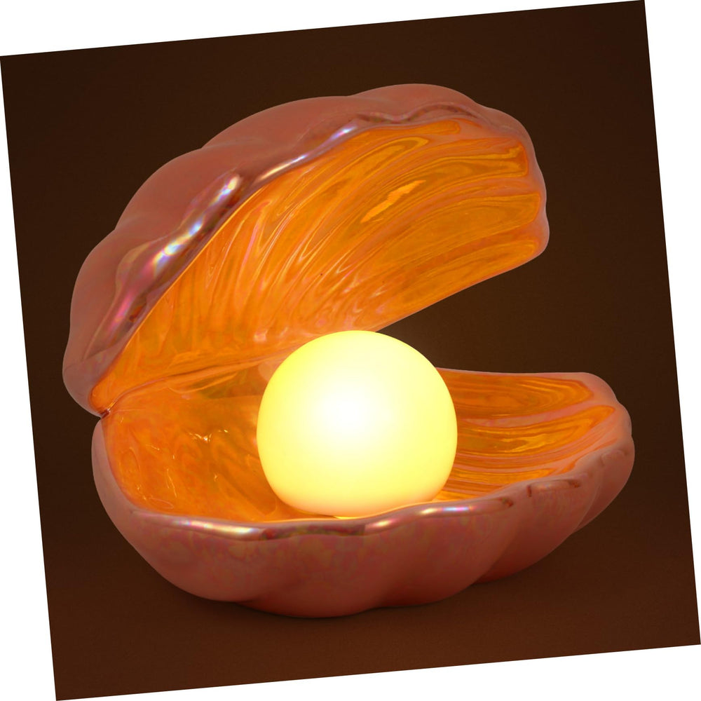 Vosarea pink night light on table adding warm ambiance
