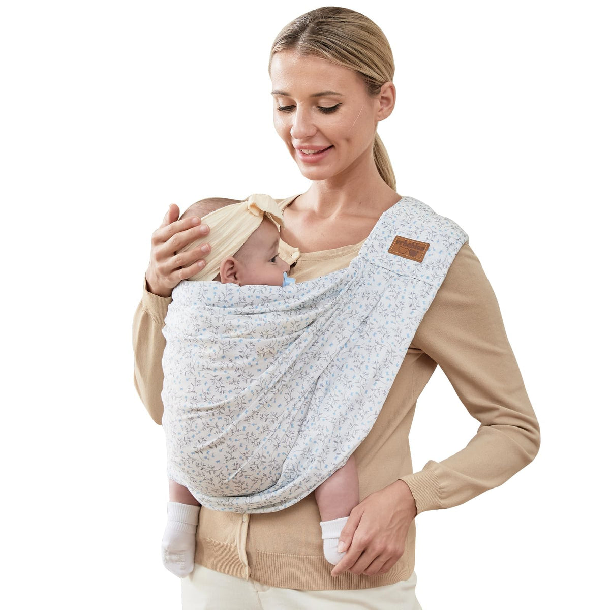 VRBabies sling in blue flower print for soft, skin-friendly carry.