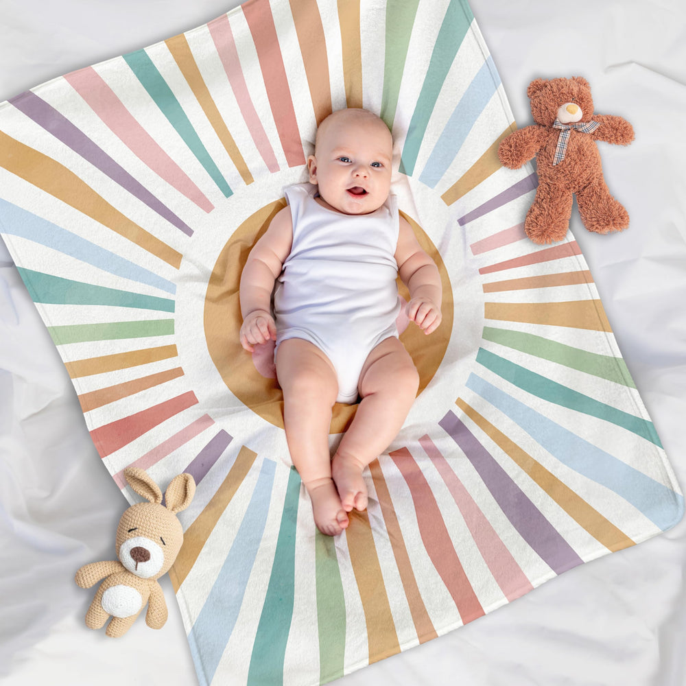 VRW Boho Abstract Sun blanket in bright colors for playful toddler bedroom styling.
