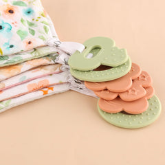 Vuminbox teether bib design blends style with teething relief.