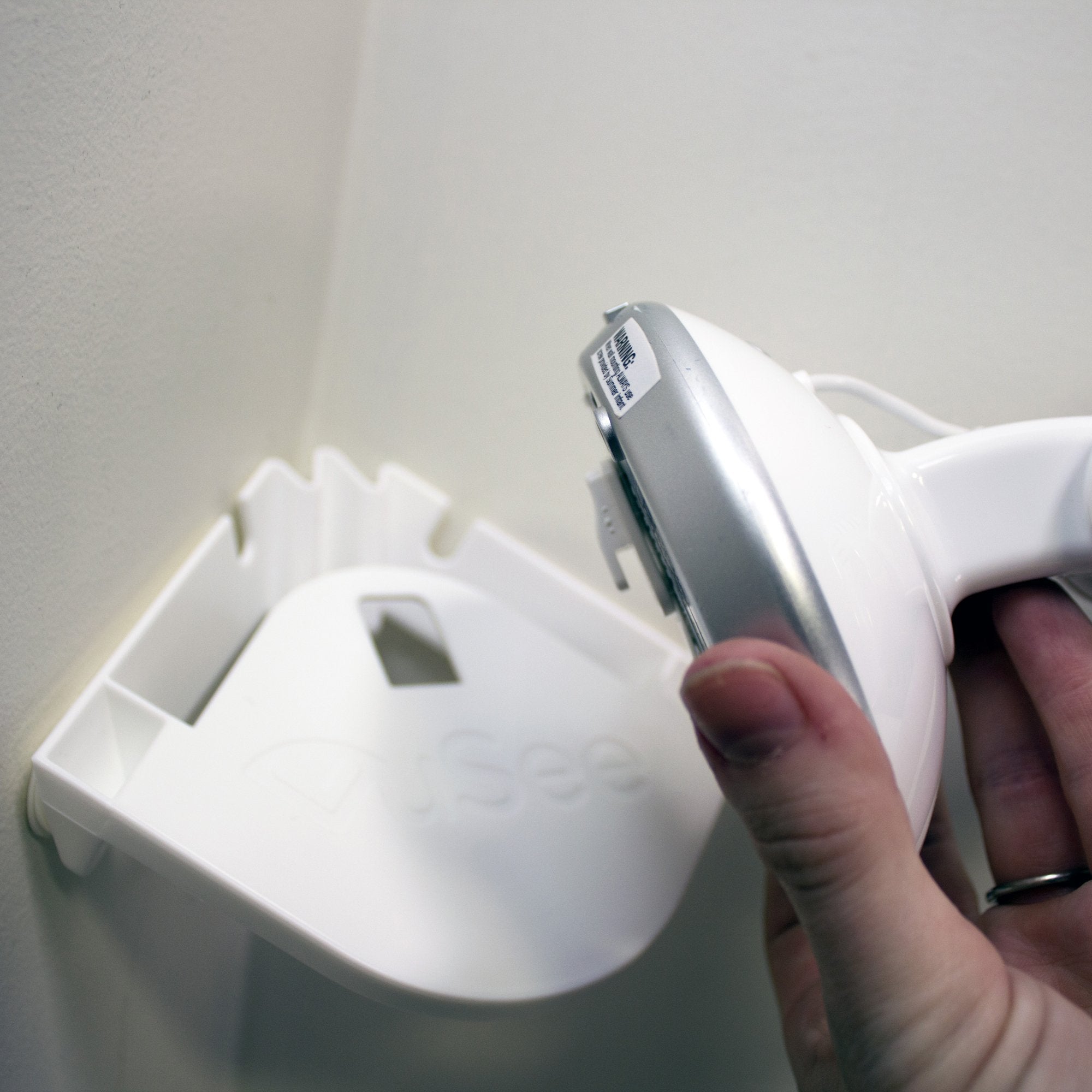 Vusee Compact space-saving mount fits small nurseries and keeps devices accessible