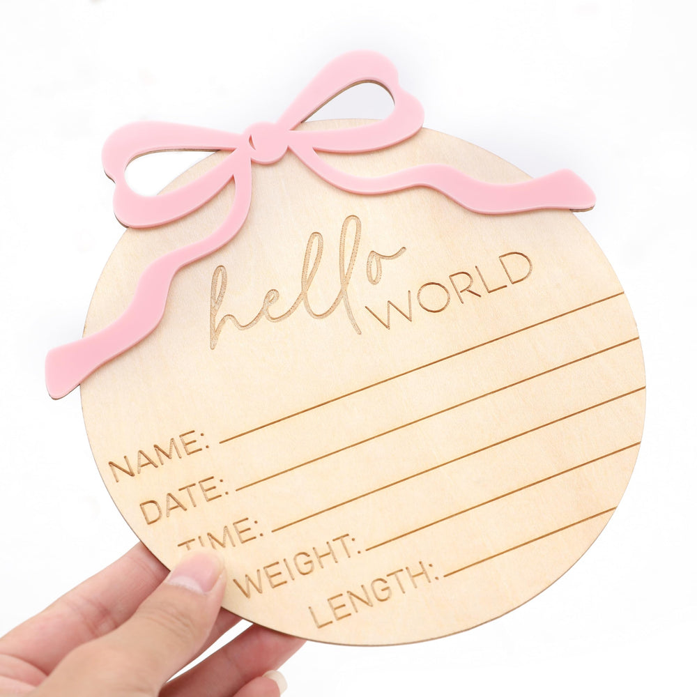 WAUAO Welcome to the World sign complements pink nursery decor