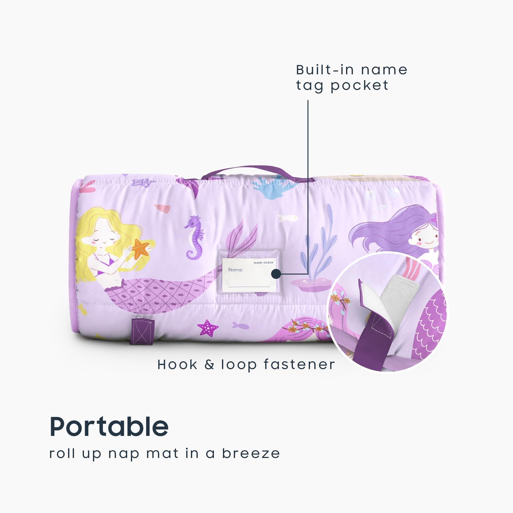 Wake In Cloud nap mat rolled and carried with handle for easy daycare transport.