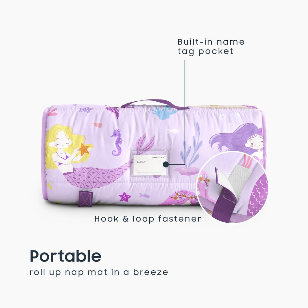 Wake In Cloud nap mat rolled and carried with handle for easy daycare transport.