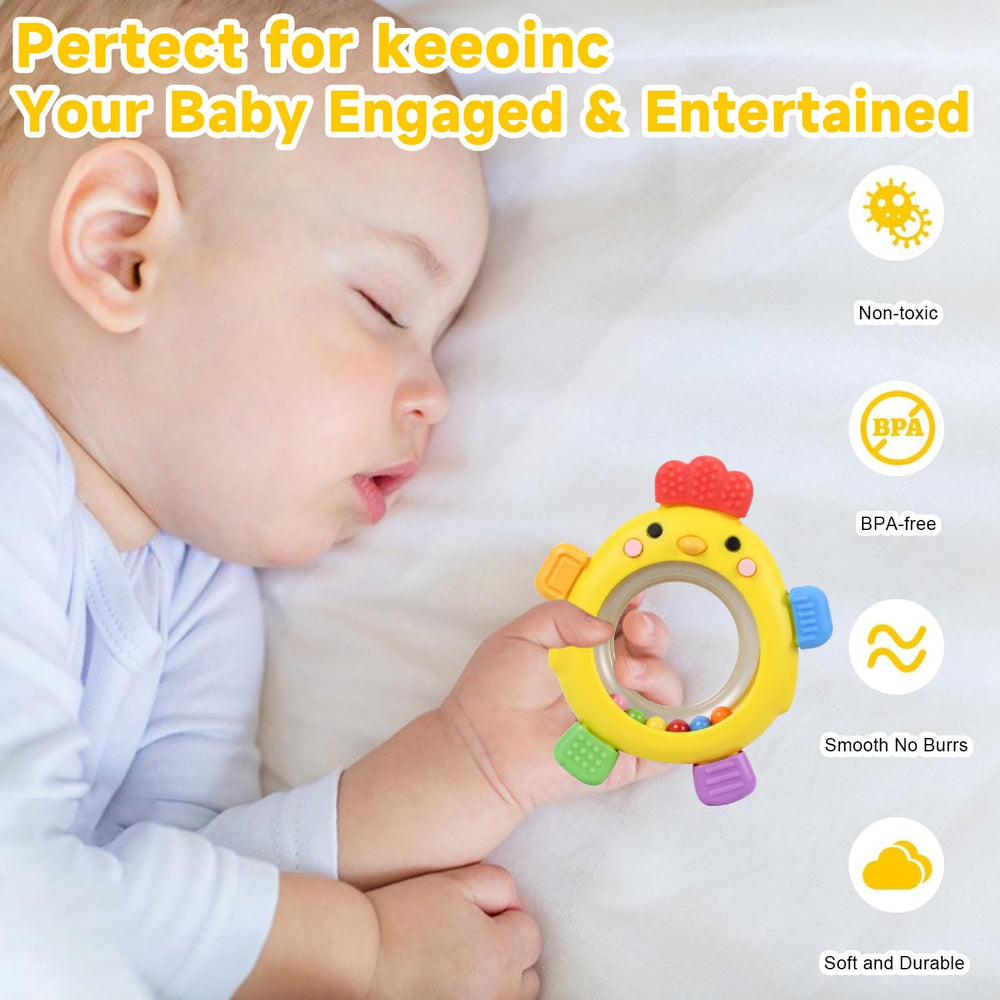 Baby holds Walulan teether ring during playtime for teething relief