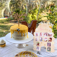 WAOUH Honeycomb Birthdays Photo Board adds whimsical charm to party decor.