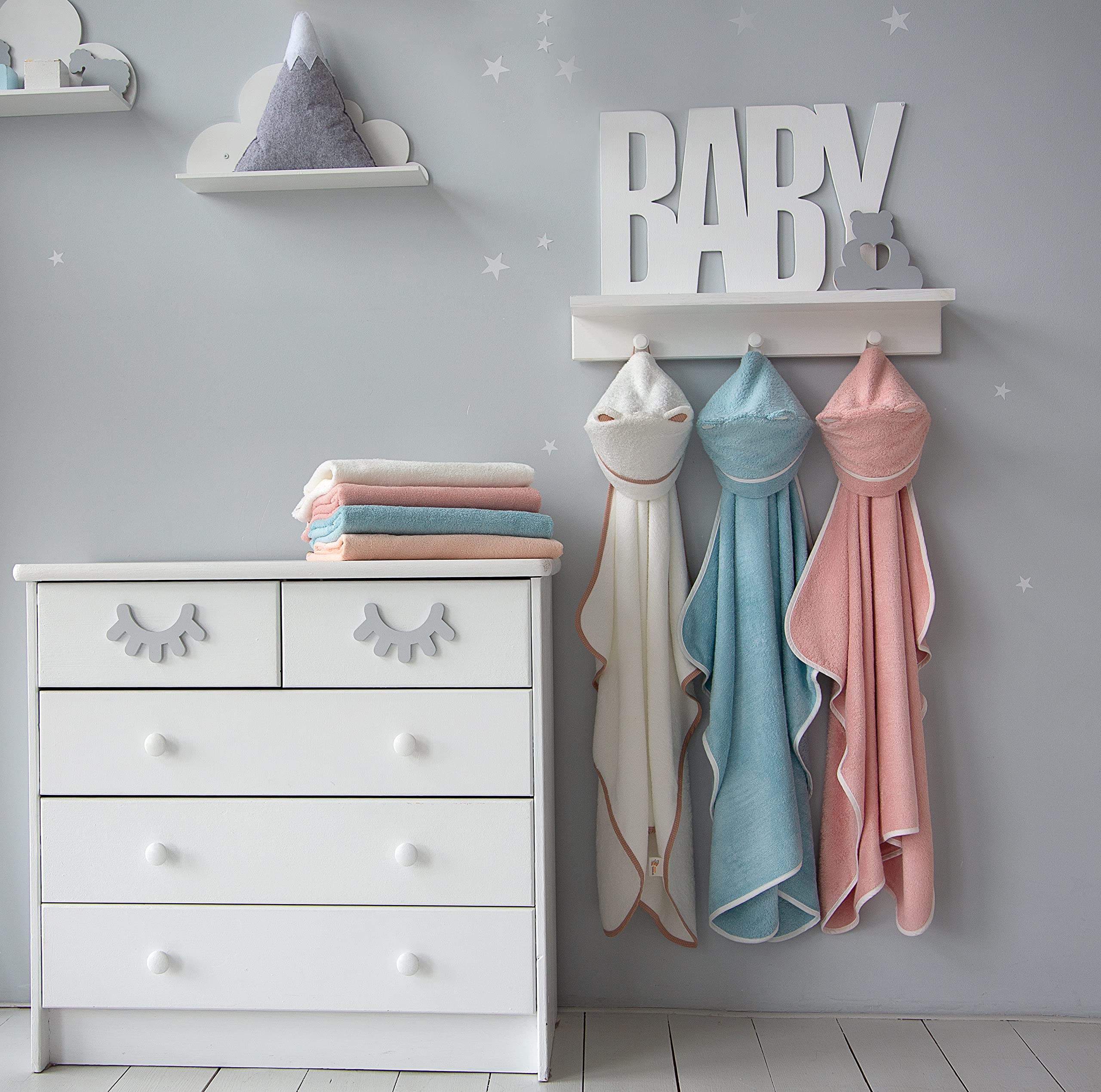 Warm Cuddles gift-ready packaging suggests a thoughtful present for new parents.