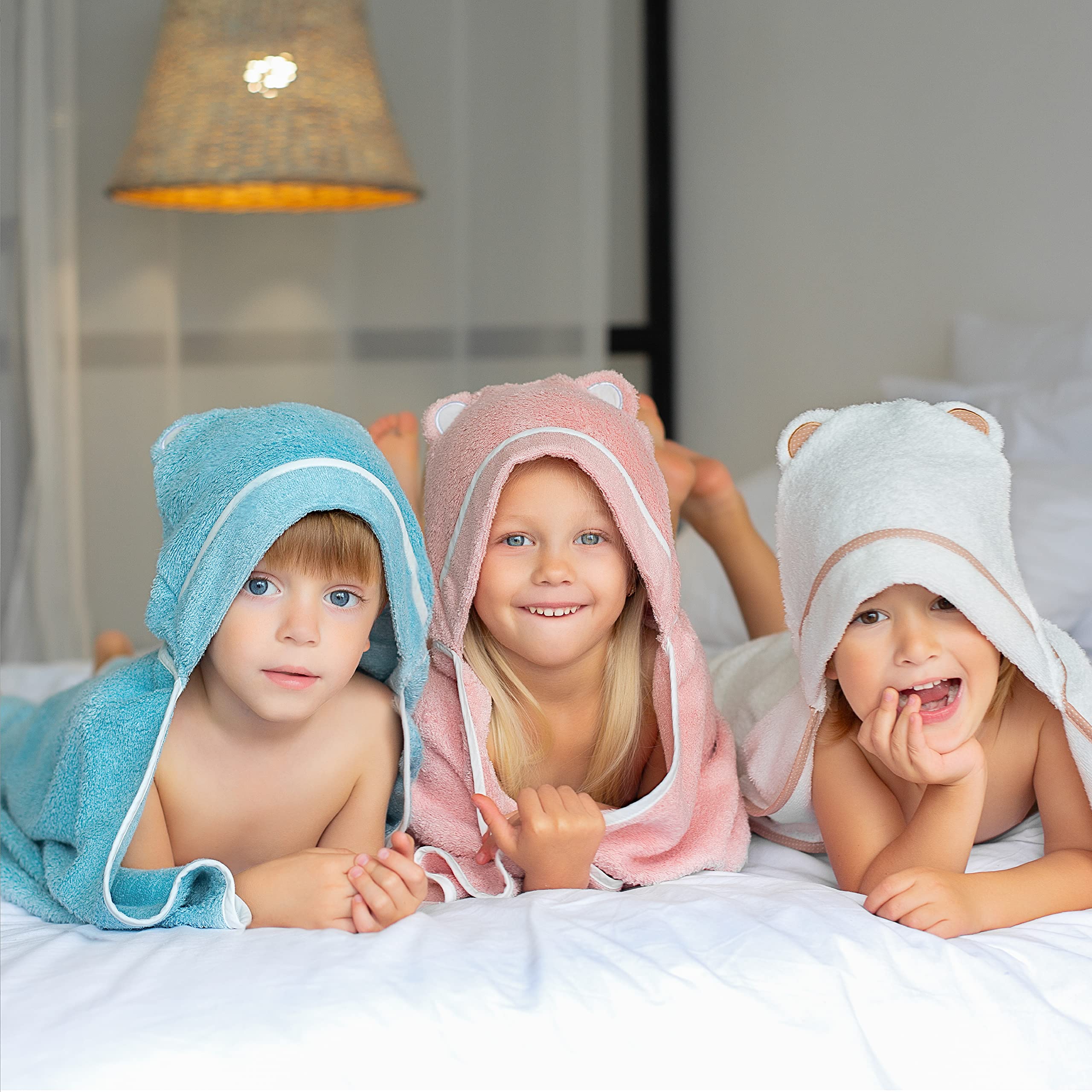 Warm Cuddles pink hooded towel, hood adds secure wrap.