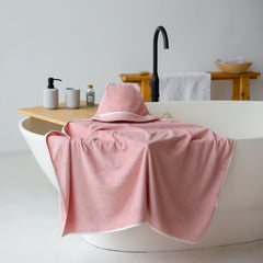 Warm Cuddles pink hooded towel, durable stitching reduces snags.