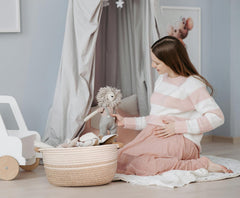 Wcro basket holding towels in bathroom for tidy storage