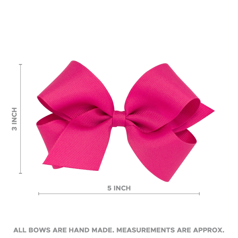 Wee Ones white bow with organza overlay displayed on WeeStay clip for everyday outfits