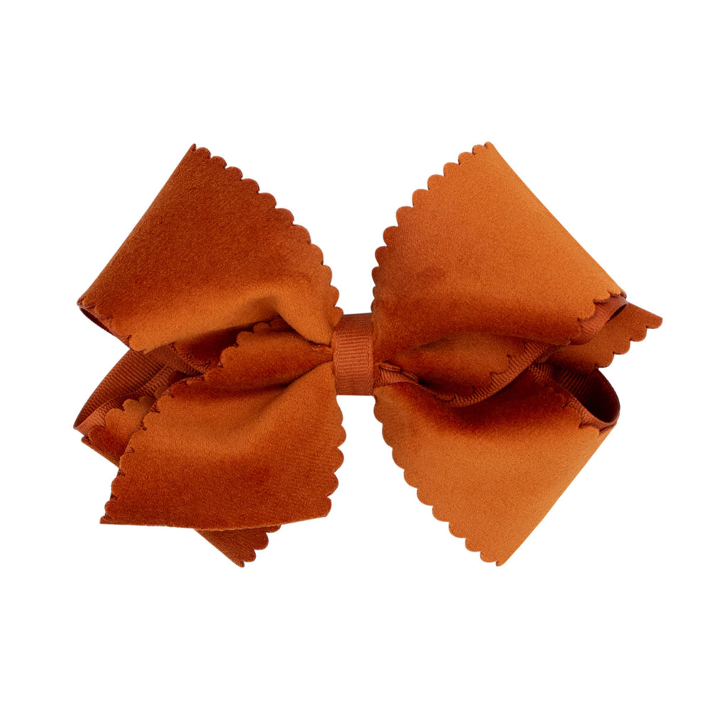 Wee Ones burnt orange bow with scalloped velvet edge for elegant everyday wear