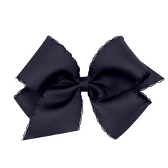 Wee Ones Moonstitch edge bow on WeeStay clip in monotone navy for all-day wear