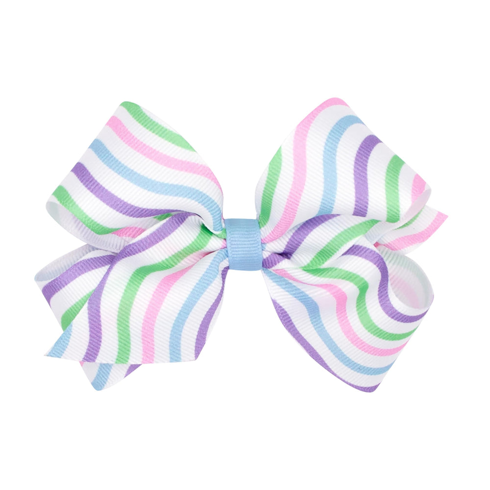 Wee Ones Easter bow on Wee Stay clip keeps hair secure during activities.