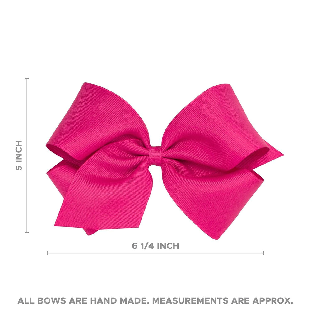 Wee Ones grosgrain bow complements outfits for parties and daily dressing.