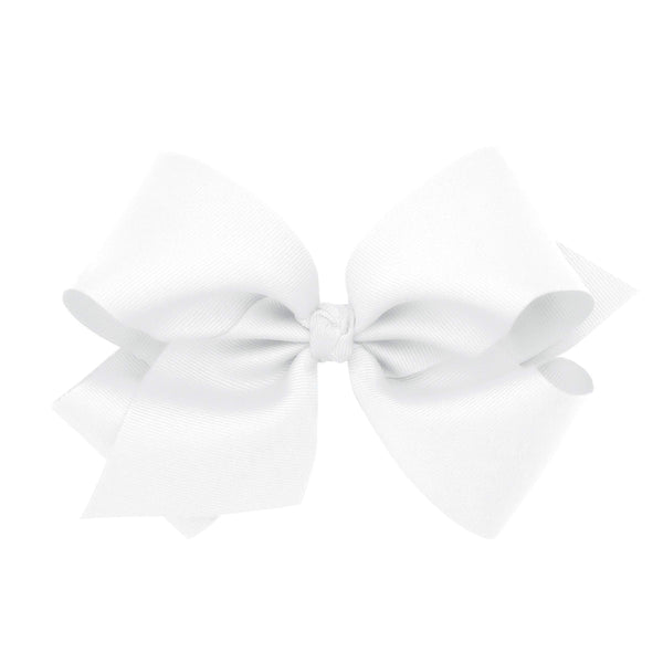 Wee Ones King White bow on a WeeStay clip for secure everyday wear