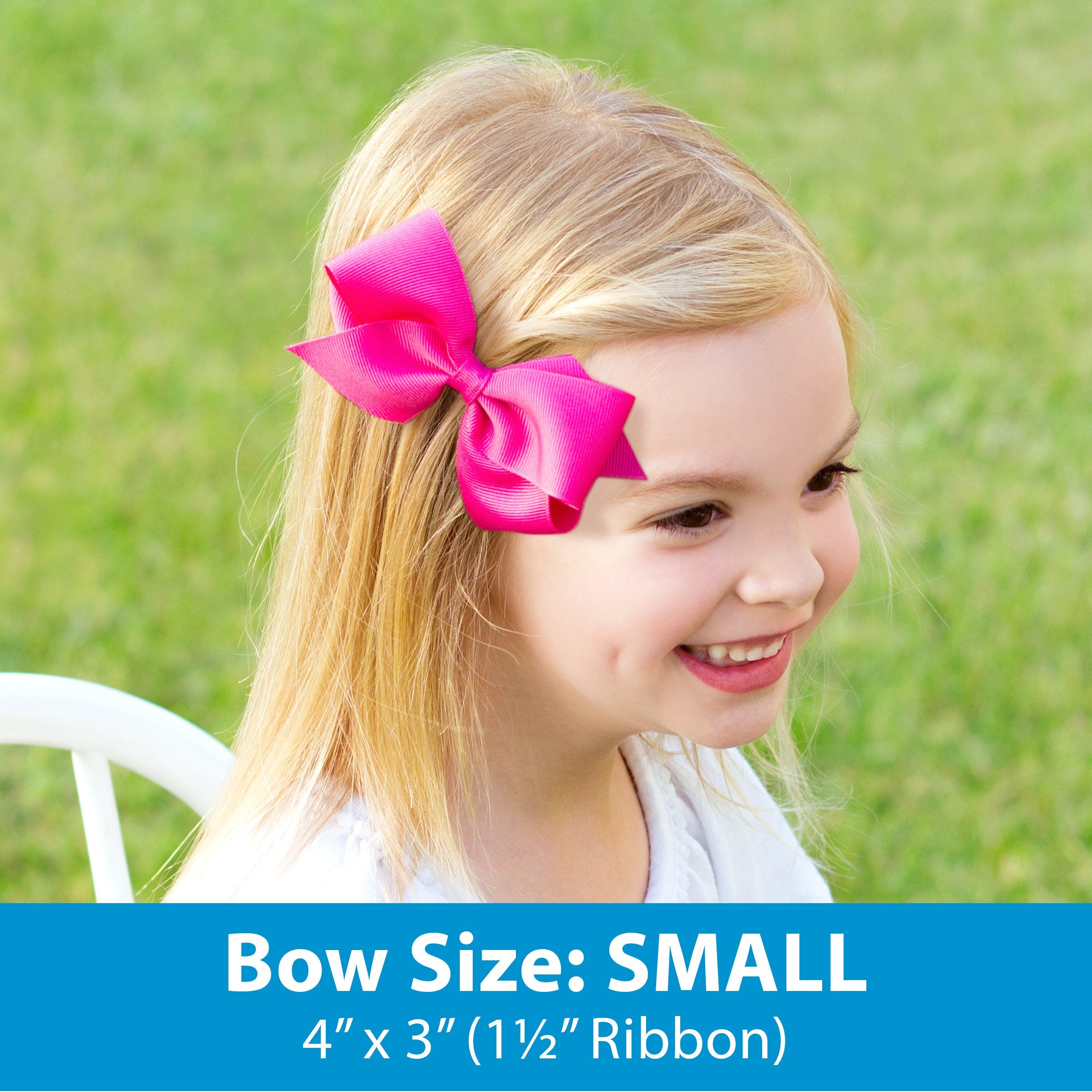 Wee Ones bow worn in hair, showcasing elegant ecru satin.